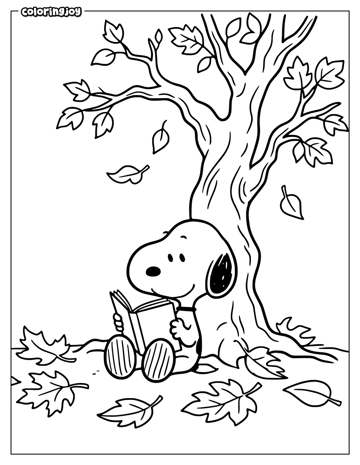Snoopy reads a book beneath an autumn tree surrounded by leaves.